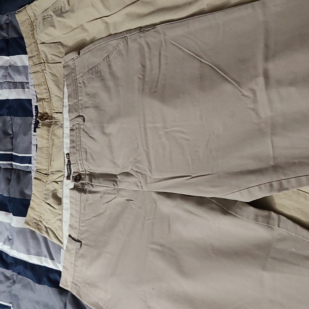 2 pairs mens khakis. 1 tommy hilfiger 1 columbia both 42x30